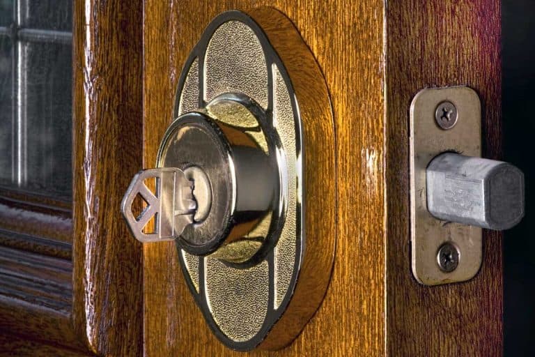 Deadbolt lock on mahogany front door, Can A Magnet Unlock A Deadbolt?