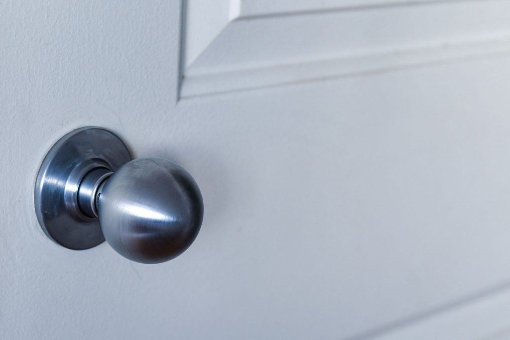 A passage door knob inside a house