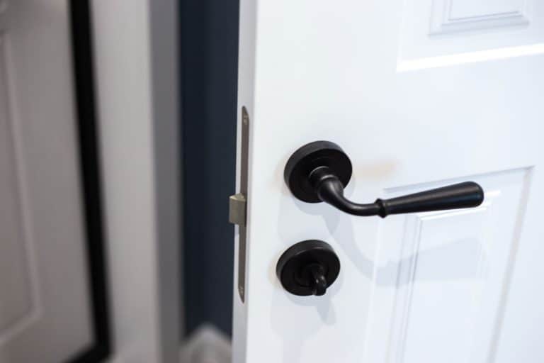 A black door handle in a front door, How Long Should A Door Handle Last?