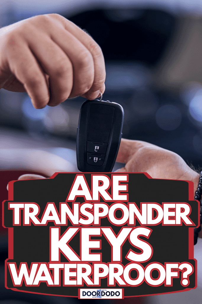 A car dealer handing the keys to the owner of a car, Are Transponder Keys Waterproof?