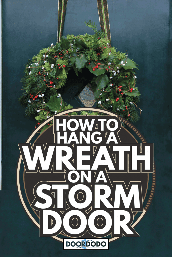 Classic christmas wreath with decorations on a door. How To Hang A Wreath On A Storm Door