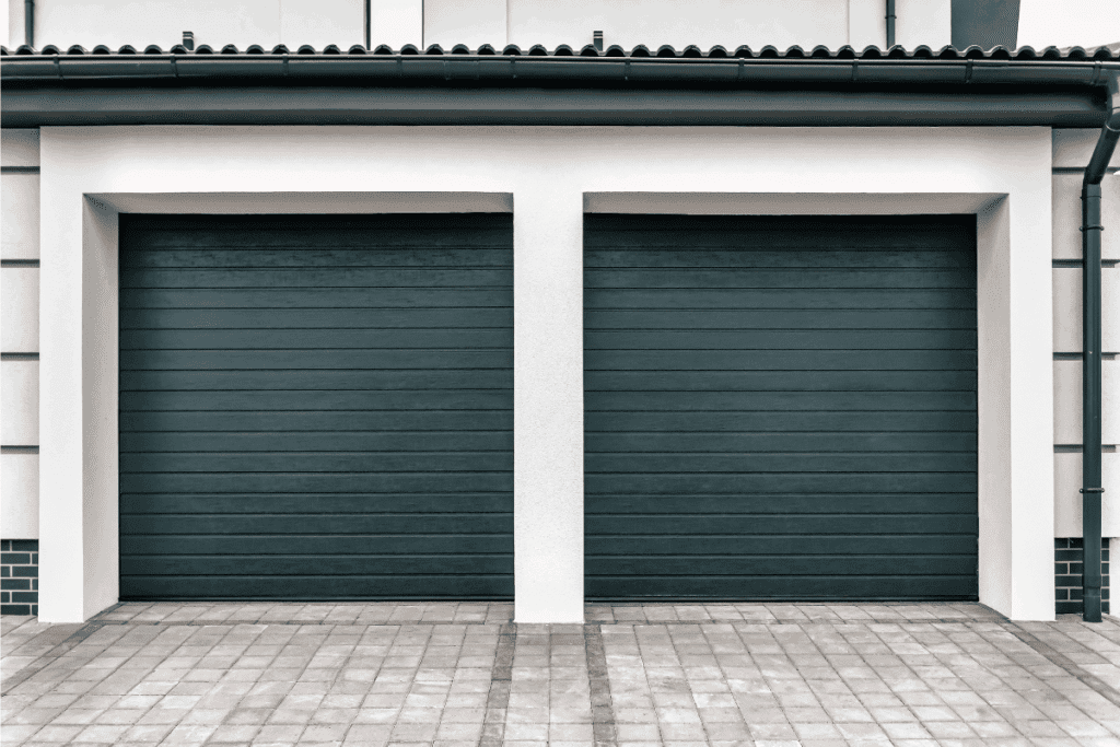 Double modern closed garage door. Can You Replace A Panel On A Garage Door [And How To]