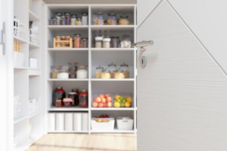 Room with organized pantry items, How To Install Sliding Pantry Doors