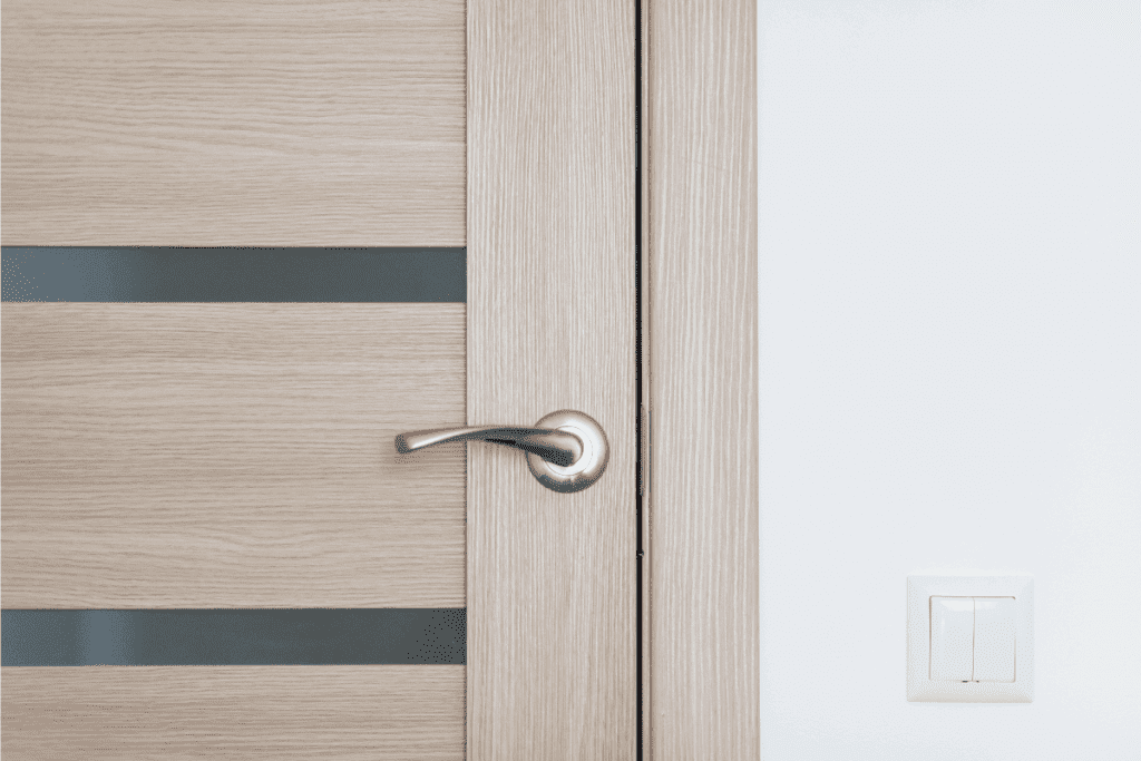 modern style door installed on a brown mdf door. Why Do Push Doors Have Handles