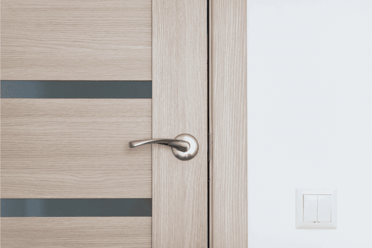 modern style door installed on a brown mdf door. Why Do Push Doors Have Handles