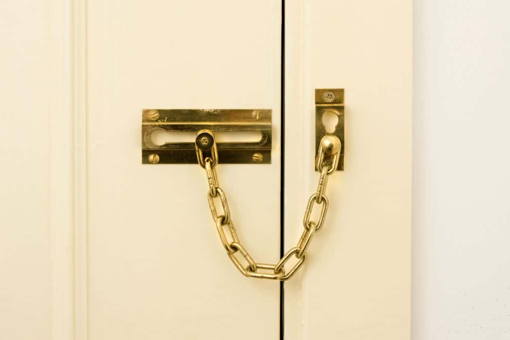 A golden chain lock in the front door