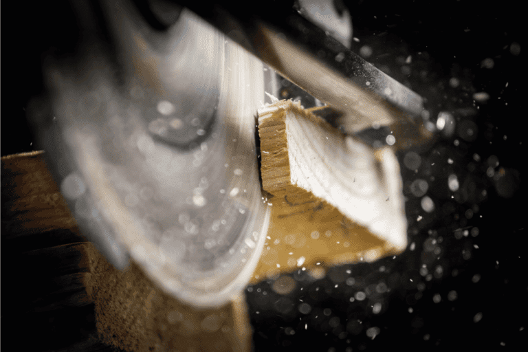 Close-up of carpenter cutting a wooden plank. Can You Cut A 6-Panel Door