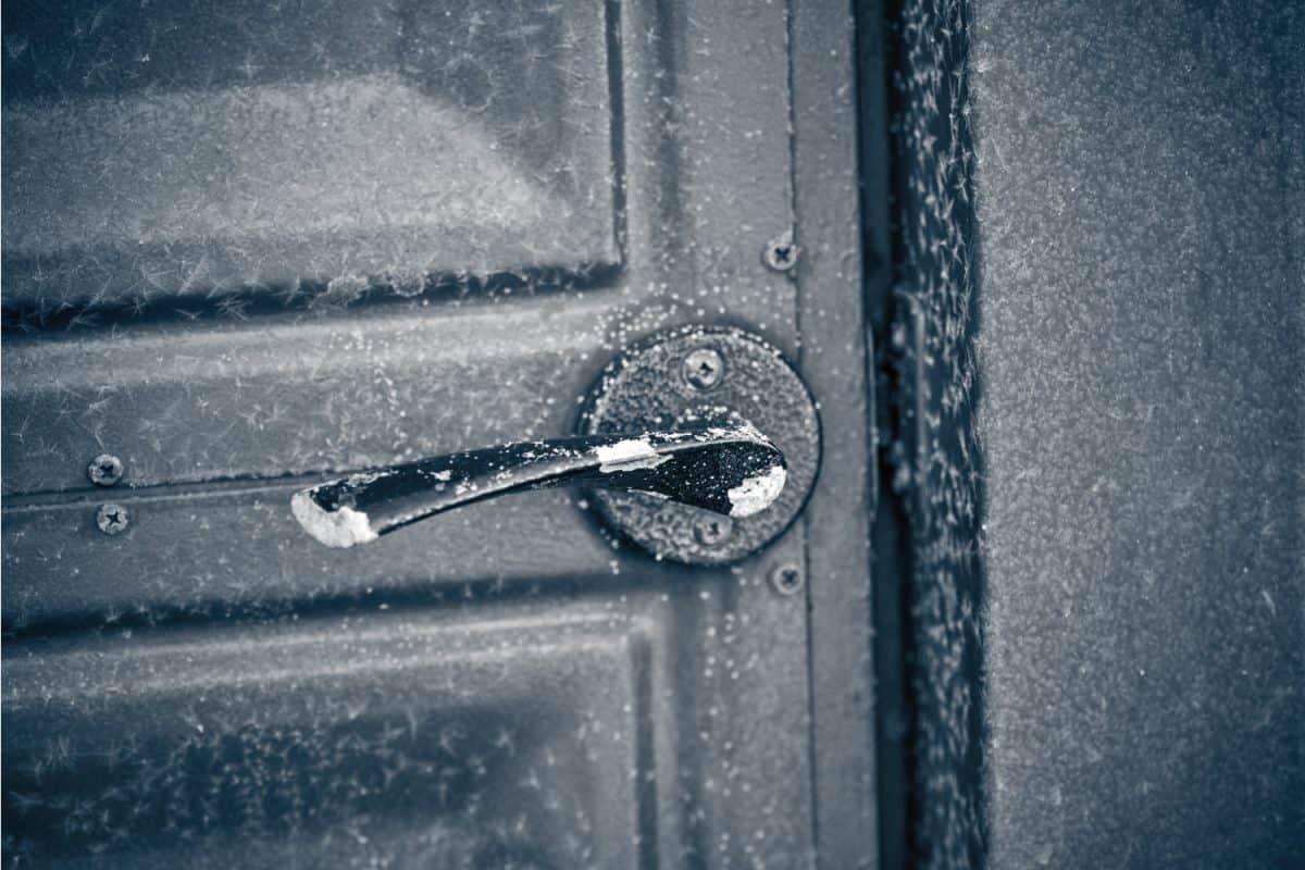 Frost door handle on the gate. Handle frosted