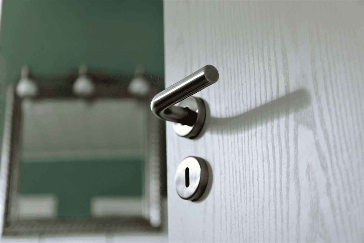 close up photo of a privacy door knob for bathrooms