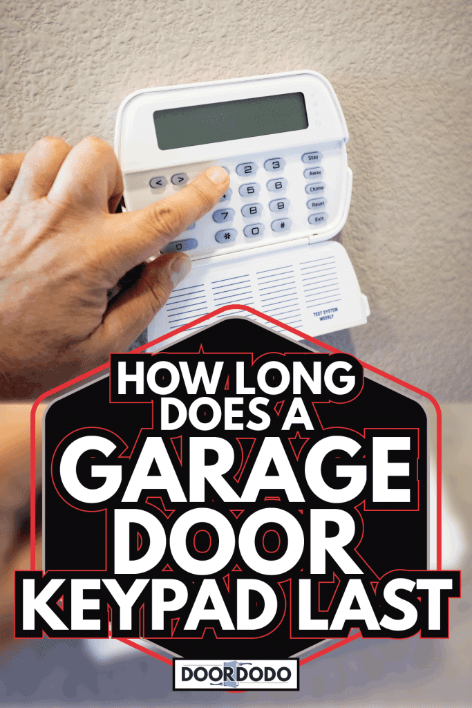 user punching in alarm code for garage door. How Long Does A Garage Door Keypad Last