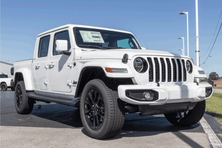 white Jeep Gladiator display at a Jeep Ram dealer. How To Install Jeep Door Handle Inserts