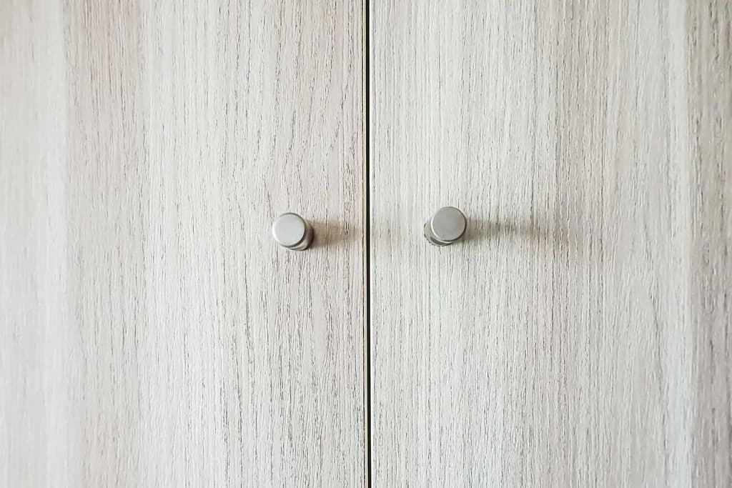 Close-up of doors of wooden wardrobe