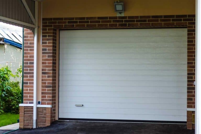 A garage gate in a private house, What Is The Best Paint To Use On A Metal Garage Door?