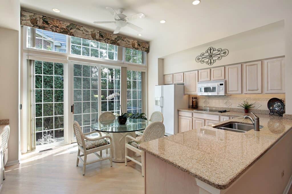 Kitchen in suburban home with sliding doors to patio
