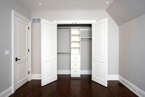 Brand new luxury home and a white wall and a white closet wide open, Closet Door Not Wide Enough - What To Do?