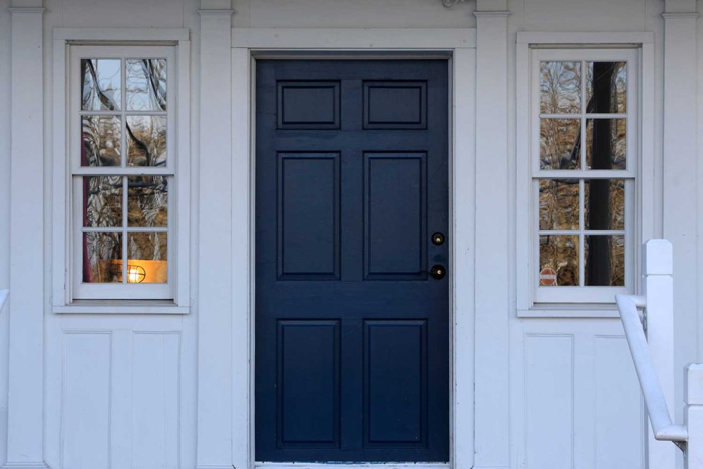Blue door with two windows