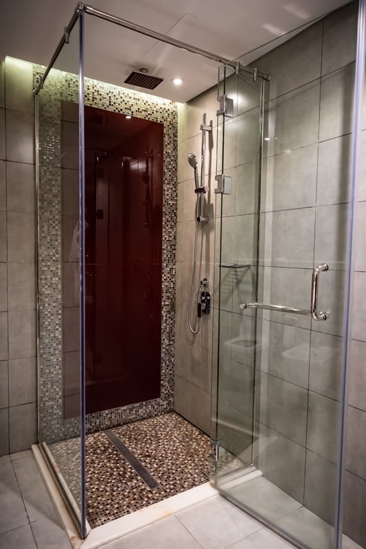 An opened glass shower door